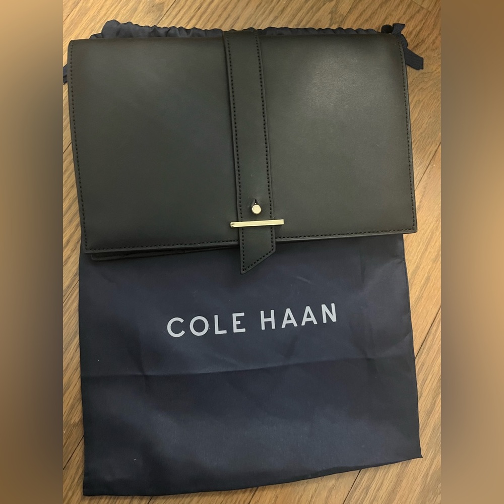 Cole Haan never worn black leather clutch with gold details